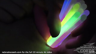 opening up teen pussy connected with glowsticks